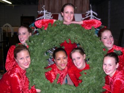 Kristen Samdahl, Ali Focke, Schuyler Midgett, Lindsay Voigtsberger, Amy Buckner, (inside wreath) Courtney Cook and Ashley Samdahl.